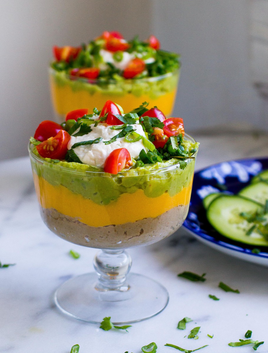 Paleo Vegan Seven Layer Dip is a healthy option for your next party! Mostly raw and completely bean free, this dip is delicious enough to be a meal on it's own!