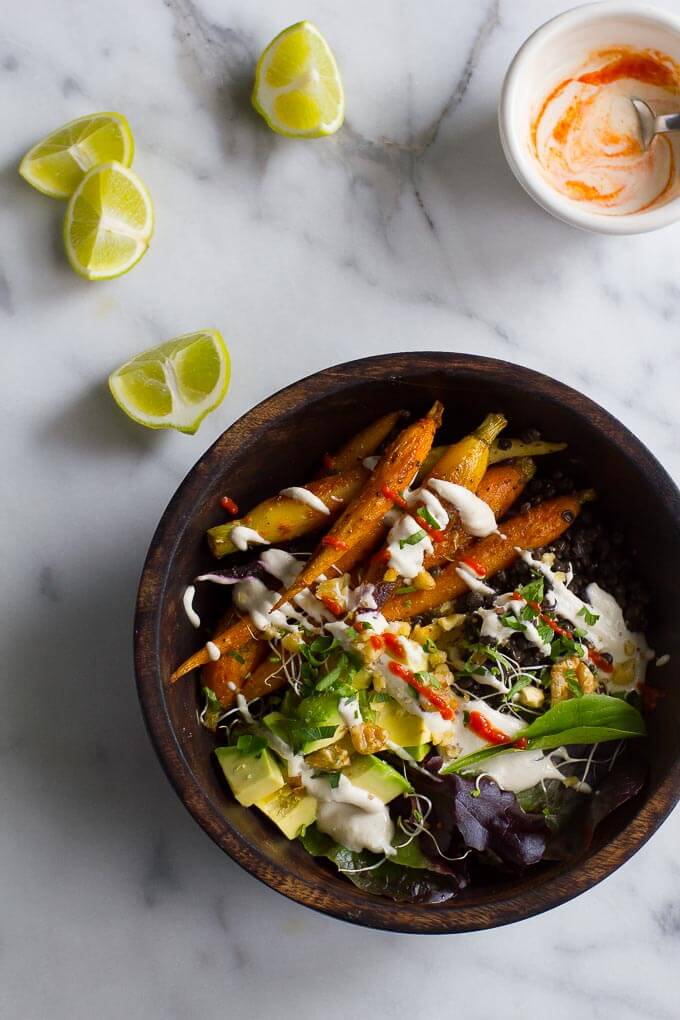 A Buddha Bowl is a great way to approach a healthy, well rounded diet and get dinner on the table in a hurry! Roasted carrots, quinoa and black lentils are a trio of powerhouse nutrition, and are delicious paired with a simple cashew yogurt!
