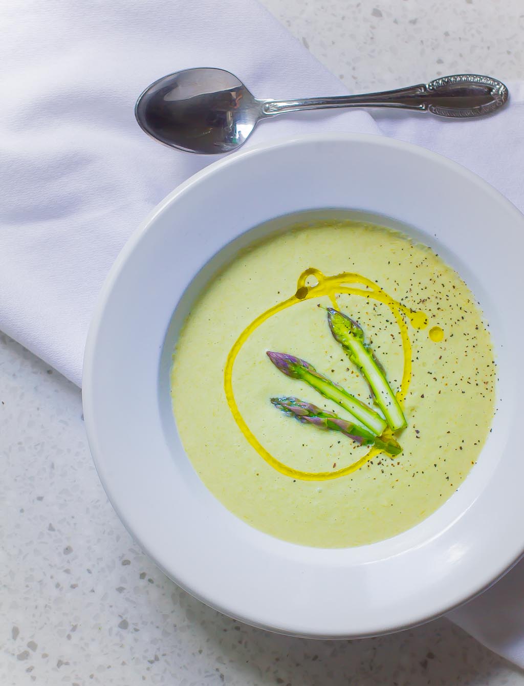 Light and creamy Cream of Asparagus Soup with almond milk and tarragon is a perfect spring time lunch.